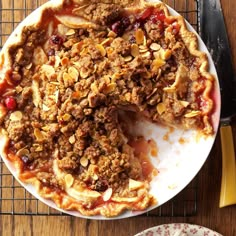 a pie on a plate with one slice taken out