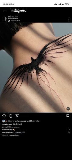 the back of a woman's stomach with black hair on it