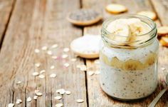 a jar filled with oatmeal sitting on top of a wooden table