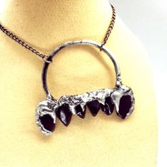 I Took An Amazing Array Of Rounded Spiked Shaped Obsidian Crystals Crafted Into A Beautifully Gothic Themed Vampire Fang Renaissance / Medieval Style Pendant , Hung From An 18" Long Matching Chain. This Isn't Your Typical Jewelry Piece, And It Will Definitely Be One Of A Kind. The Metal Work Is Hand Done By Me Using A Silver Bearing Low Melting Alloy That Has Been Patinaed, Polished And Sealed For Lasting Beauty. This Comes A Gunmetal A 18in Chain Will Be Attached. Can Request Any Length Between Silver Jewelry For Halloween Alternative Fashion, Handmade Edgy Jewelry For Halloween, Edgy Sterling Silver Jewelry For Halloween, Unique Black Jewelry For Alternative Fashion, Gothic Oxidized Jewelry For Halloween, Edgy Handmade Silver Necklace, Halloween Gothic Jewelry With Oxidized Finish, Handmade Edgy Halloween Jewelry, Handmade Edgy Necklace For Halloween