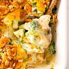 a casserole dish with broccoli and cheese