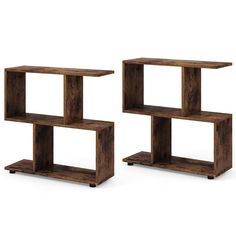 a set of three wooden shelves sitting next to each other