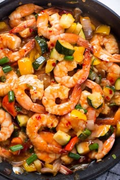 shrimp and vegetable stir fry in a skillet