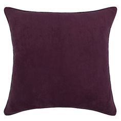 a purple pillow on a white background