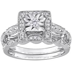 an engagement ring set with a princess cut diamond in the center and two matching bands