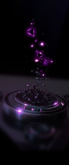 a purple object floating in the air on top of a black surface