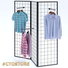 three shirts hanging on clothes racks in front of a white background with the caption, store