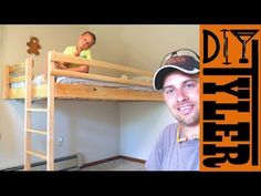 two men sitting on top of bunk beds in a room with wooden floors and walls