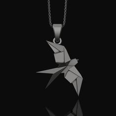 Silver Origami Swallow Necklace - Elegant Folded Bird Pendant, Artistic Nature Jewelry, Perfect Delicate Gift for Her Discover the allure of our Swallow Necklace, a masterpiece of Elegant Origami artistry. This exquisite piece features a Silver Pendant designed as an Origami Swallow, symbolizing freedom and elegance. As a piece of Nature Jewelry, it incorporates a Folded Bird Charm, adding a touch of Delicate Necklace craftsmanship. The Feminine Pendant is ideal for those who appreciate Chic Swa Origami Swallow, Swallow Necklace, Necklace Elegant, Bird Charm, Bird Pendant, Personalized Pendant, Unique Gifts For Her, Pendant Design, Nature Jewelry