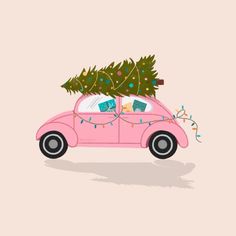 a pink car with a christmas tree on top