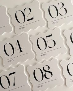 the numbers are numbered in black and white for each individual to use on their place cards