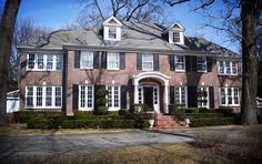 a large house with many windows and steps leading up to the front door is shown in this collage