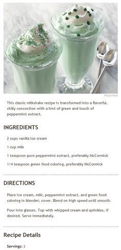 an image of two green drinks with whipped cream