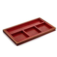 a red tray with three compartments on it