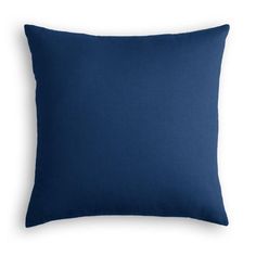 a dark blue pillow on a white background with the word's name written in it