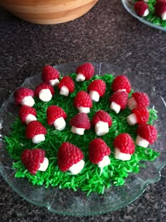 a cake with strawberries and marshmallows on it