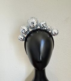 Asymmetric Disco Ball Dancing Queen Crown LISTING SPECS: - 6 multi-size disco balls -1-inch satin wrapped headband base for superior comfort - Handmade to order **Looking for something a little different? more butterfly headbands, crowns, and masks: https://www.etsy.com/shop/muliebritymade/?etsrc=sdt&fbclid=PAZXh0bgNhZW0CMTEAAaa3192460EBjq5Xe7E0emwuISXuAWC2-XGuEA8z7Qp6nJ0zK3Fe9rNO92U_aem_z1YZ1pKXQmJ8V0bMqQuCAQ&load_webview=1&bid=M7oMYbcYYkrebKTpX19upSW4nBTV§ion_id=33299170 colorful home decor: h Adjustable Silver Headpiece For Carnival, Silver Adjustable Headpieces For Carnival, Fun Party Hair Accessories For Carnival, Adjustable Headband For Carnival Party, Adjustable Headband For Party And Carnival, Adjustable Headpiece For Carnival Party, Adjustable Headpieces For Carnival Party, Adjustable Headpiece For Party And Carnival, Fun Adjustable Party Headpieces