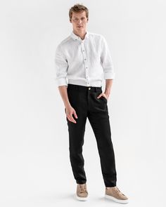 "Regular fit straight leg men's linen pants SOGLIO in Black is a summerish take on classic pants. Their design is smart and functional, making these pants a perfect fit for both casual and work outfits. Linen fabric equals comfort as it is extremely breathable. Pair these linen pants with loafers or sandals depending on the occasion, add a linen shirt and your summer outfit is complete. Details: * Regular-straight leg, mid-rise style * Flat waist band in front, elasticated waist in back * Zip fly with a coconut button closure * Two front angled pockets, two back pockets * Medium weight linen (approx. 200 gsm) * The model is wearing black pants in size M (Paired with a white shirt NEVADA in size M) and is 6'1\" (187cm) tall. Model measurements: Bust: 37\"/94cm | Waist: 30'3\"/77cm | Hips: 3 Straight Fit Straight Pants For Summer, Summer Straight Fit Pants, Modern Straight Leg Linen Bottoms, Modern Linen Straight Pants, Modern Linen Trousers, Modern Linen Straight Leg Bottoms, Casual Linen Dress Pants With Welt Pockets, Modern Linen Bottoms With Straight Hem, Slim Fit Linen Pants With Welt Pockets