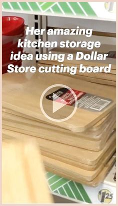 a stack of wooden cutting boards sitting on top of a counter