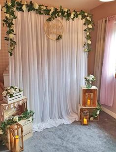 the wedding stage is decorated with flowers and candles