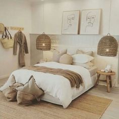 a bedroom with white walls and neutral decor