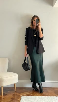 This satin slip skirt is a longer length than the usual ones that I stock. It is perfect for taller ladies. Or good as a maxi skirt length, The model in this picture is @mytall40s (instagram page for tall fashion) Abby is 6"1 so you can see it is a great length for taller ladies. Length measured on a size 12 is 105cm 65% polyester 35% viscose 30 degree wash, do not tumble dry Formal Long Skirt Outfit, Long Skirt Business Casual, Navy Slip Skirt Outfit, Satin Skirt Winter Outfit, Maxi Satin Skirt Outfit, Slip Skirt Outfit Winter, Business Casual Skirt Outfits, Satin Slip Skirt Outfit, Green Satin Skirt Outfit