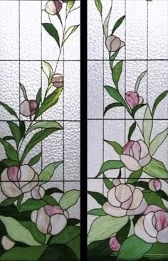 two stained glass windows with flowers on them