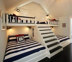 there is a bunk bed with stairs in the room that has two beds on it