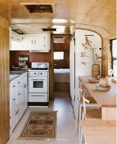 the kitchen and living area of an rv