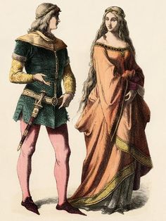 two people dressed in medieval clothing standing next to each other