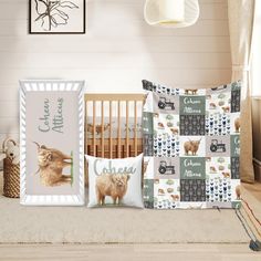 a baby crib with two pillows and pictures on the wall next to each other