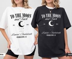 two women standing next to each other wearing t - shirts that say to the moon and back