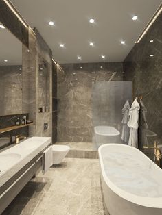 a bathroom with two sinks and a bathtub