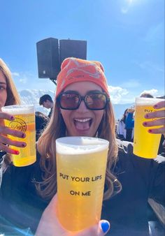 two women holding up beer glasses with the words put your life on me written on them