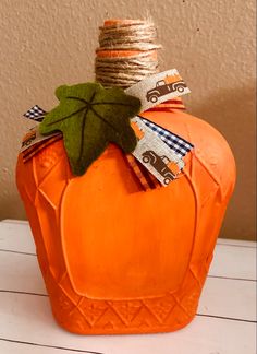 glass-bottle-orange-pumpkin-fall-decor Crown Royal Bottle, Pumpkin Painted, Crown Bottle, Liquor Bottle Crafts, Diy Crown, Halloween Crafts Decorations, Wine Bottle Diy Crafts