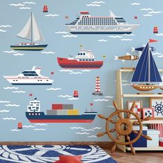 a child's room with ships and boats on the wall