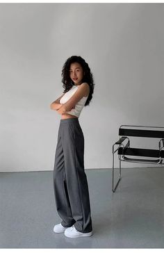 Introducing our High-Waist Loose Wide-Leg Suit Trousers from the 2023 Summer Collection. These trousers feature a stylishly loose fit with a flattering high waist. The straight leg and floor-length cut provide a slimming effect, while the drapey design adds a touch of sophistication. A chic and comfortable addition to your summer wardrobe. Details Composition: 80% Polyester Fiber, 20% Viscose Fiber Design: Plain Style: Casual Thickness: Regular Occasion: Leisure Size & Fit Stretch: Some-stretch Gray Non-stretch Wide Leg Workwear Pants, Gray Non-stretch Wide Leg Pants For Work, Non-stretch Gray Wide Leg Workwear Pants, Gray High Waist Wide Leg Pants For Business Casual, Chic Gray Pants, Trendy Wide Leg Bottoms For Office, Casual High Waist Wide Leg Office Pants, Trendy Wide Leg Office Bottoms, Chic Gray High-waisted Wide Leg Pants