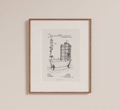 a framed drawing of a boat on the water with an old fashioned faucet