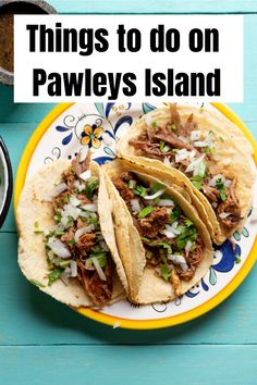 three tacos on a yellow and blue plate with the words things to do on pawley's island