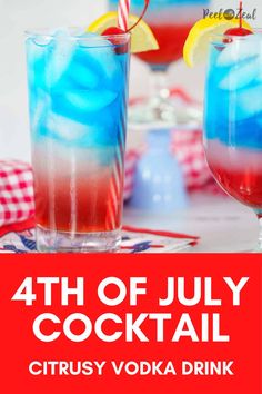 two glasses filled with red, white and blue cocktails on top of a table