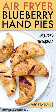 the cover of an air fryer blueberry hand pies recipe on a white plate