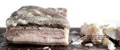 a close up of food on a plate with some sort of meat in the middle