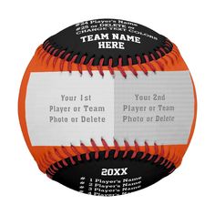 an orange and black baseball with the team name here on it's back side