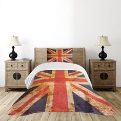 an image of a bedroom setting with the british flag on it's comforter