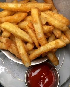 french fries and ketchup on a plate