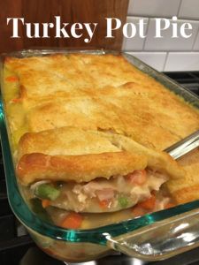 a turkey pot pie in a casserole dish