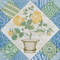 a painting of flowers in a vase on a blue, green and white checkered background