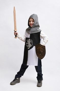 🛡️ Embark on a gallant journey back to the age of valor and chivalry with our stunning Knight Edward Outfit! 🛡️🏰 Are you ready to transform your young squire into a noble knight? Our meticulously handcrafted Knight Edward outfit is the perfect ensemble for your child's medieval adventures! Whether attending a festive carnival, participating in a school play, or seeking the ultimate Templar costume for a themed party, this outfit will make your little one the talk of the realm. Crafted from hi Costume Chevalier, Noble Knight, Knight Costume, Lion Print, School Play, Timeless Gifts, Chain Mail, Themed Party, Pretend Play