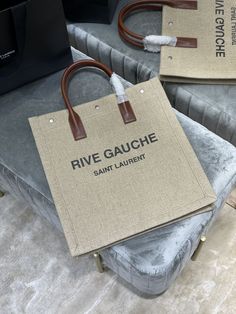 Description S.L Rive Gauche North/South Tote Bag In Printed Linen For Women 15.3in/39cm YSL Rep 1:1 Size: 38 x 39 x 17 cm/ 14.9 X 15.3 X 6.6 inches Linen & cotton Metal hardware Snap-button closure Handle: double An inner zip pocket Three S.L – Engraved snap buttons at the top Include dust bag. This product is of the best quality. Yves Saint Laurent Bags, Luxury Products, Rive Gauche, North South, Saint Laurent Bag, Printed Linen, Metal Hardware, Snap Button, Contact Us