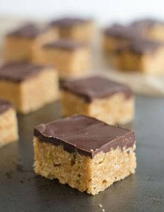 several pieces of cake sitting on top of a table